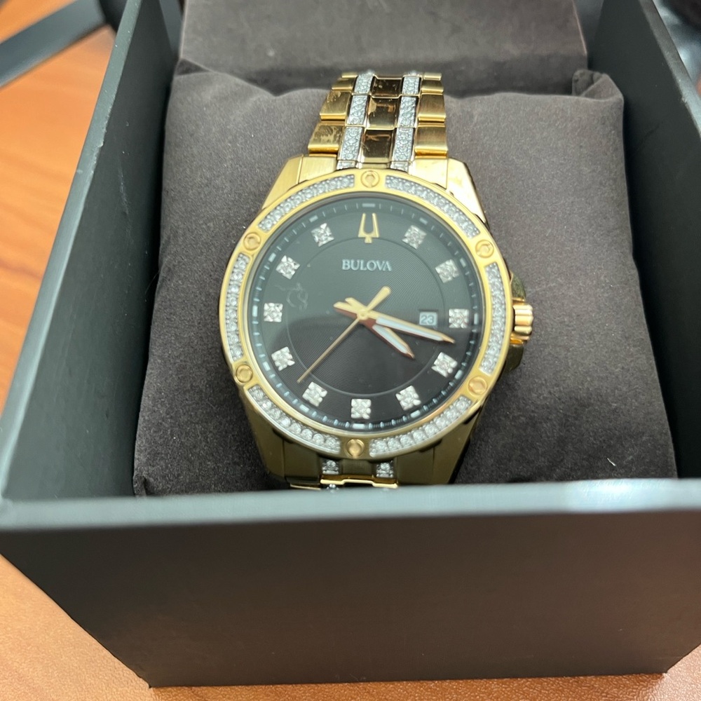Bulova Gold and Black Timepiece with Crystal Accents